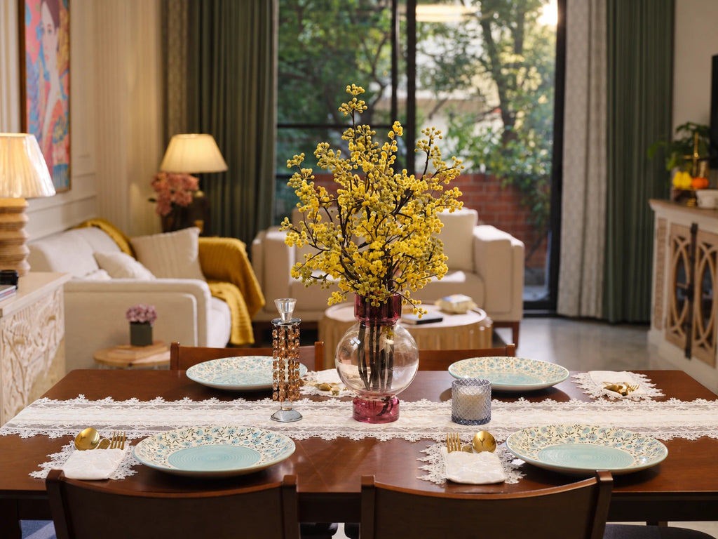 The Amélie Lace Table Runner by Uahan styled in a sunlit dining room