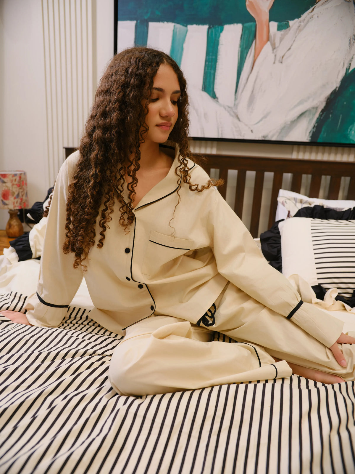 The Madeleine Set by Uahan, stretching out on the bed
