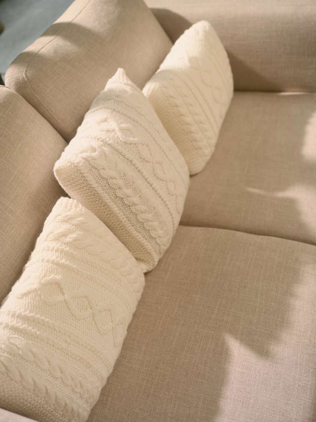The Maman Cable-Knit Cushion Covers by Uahan — cable-knit texture from above