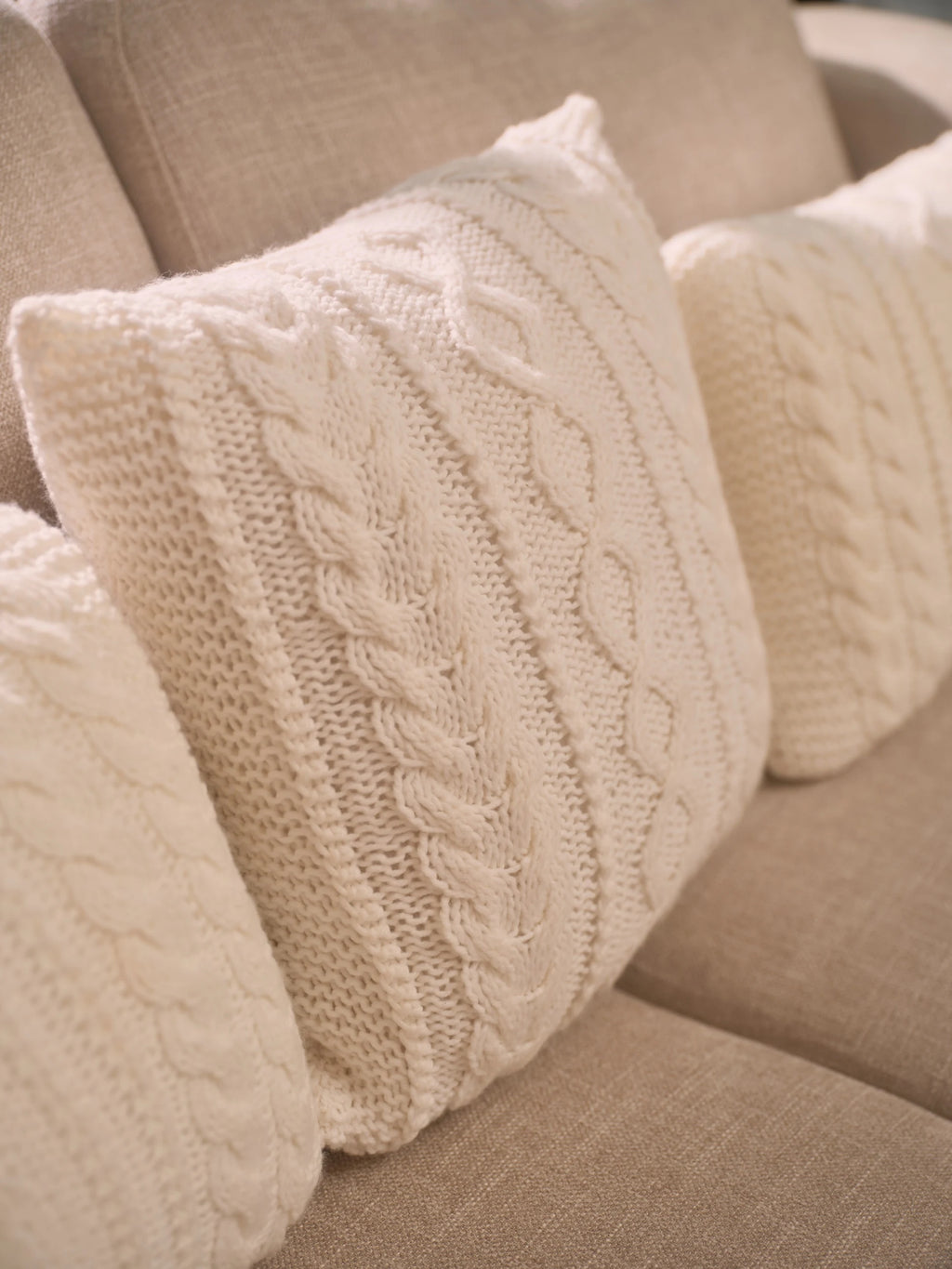 The Maman Cable-Knit Cushion Cover by Uahan — close-up of the hand-knit cable pattern