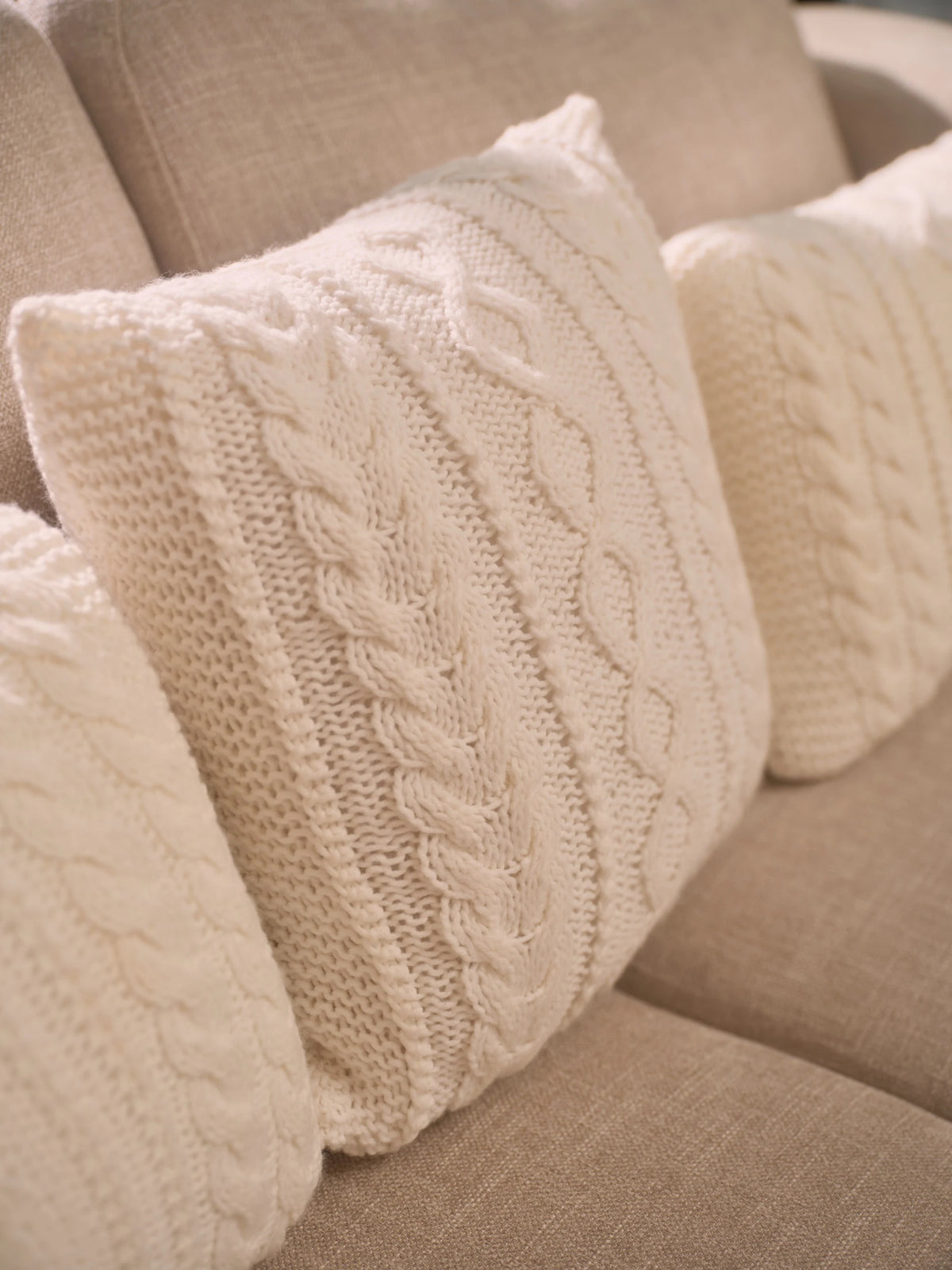 The Maman Cable-Knit Cushion Cover by Uahan — close-up of the hand-knit cable pattern