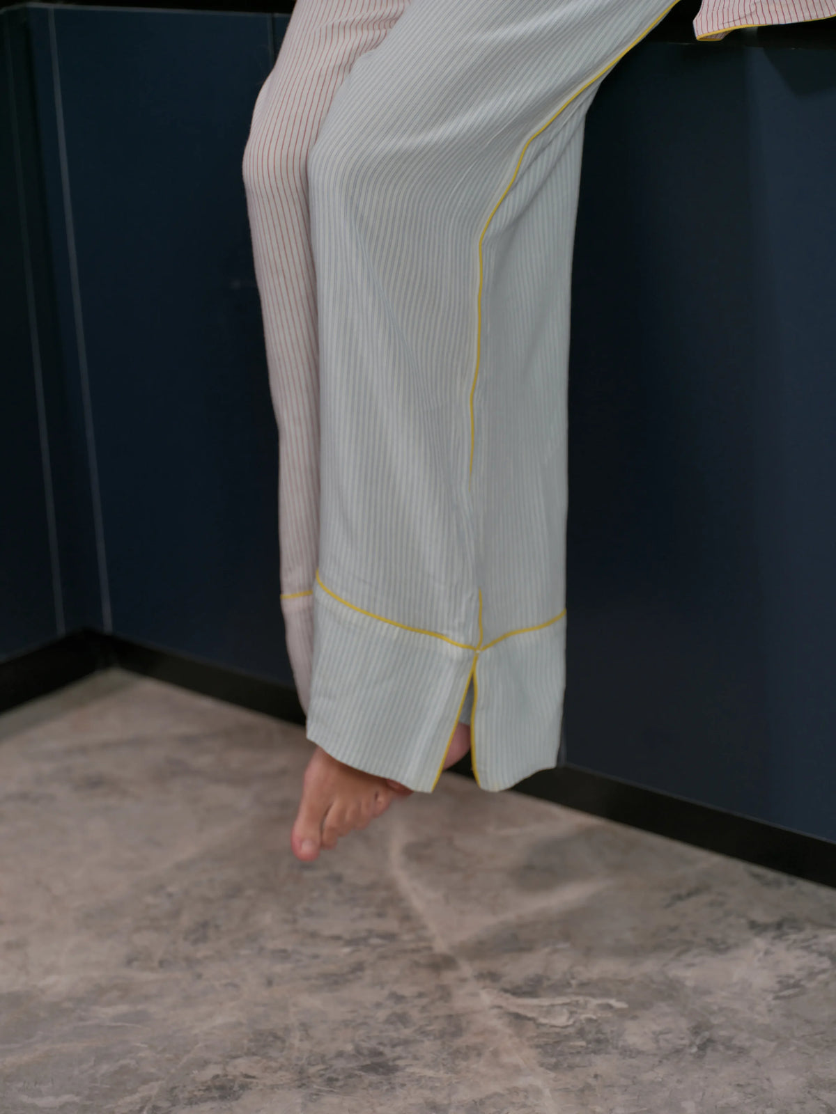 The Rhythm Set by Uahan — trouser hem with yellow piping